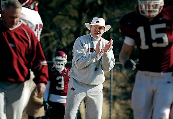 Arkansas head coach Houston Nutt gets his team motivated during practice at Brentwood Academy on Dec. 27, 2002, as they prepare for the Music City Bowl. Houston Nutt Music City Bowl.