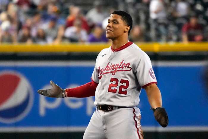 Washington Nationals’ Juan Soto jokes around with the Arizona Diamondbacks in the first inning during a baseball game, Sunday, July 24, 2022, in Phoenix.