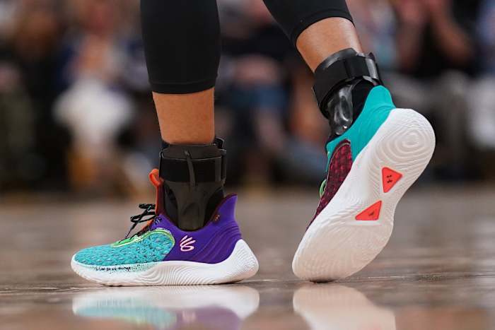 Golden State Warriors point guard Stephen Curry wearing the Curry Flow 9 'Black History Month'.