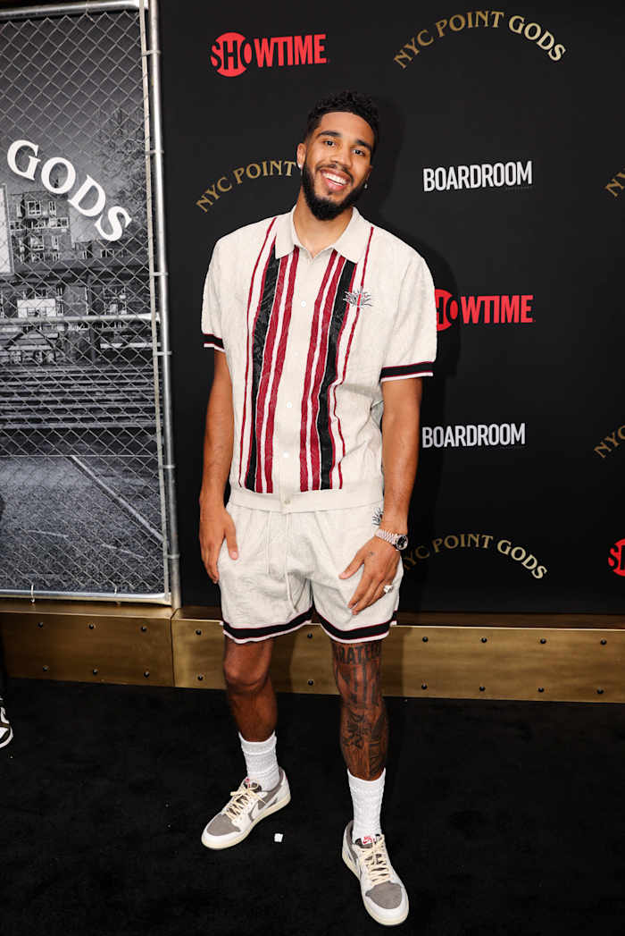 Jayson Tatum wears Travis Scott x Air Jordan 1 sneakers at the NYC Point Gods Premiere at The Midnight Theatre.