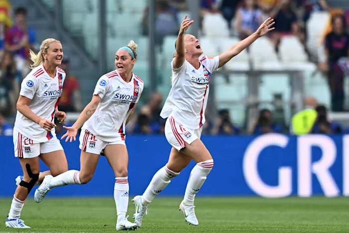 Amandine Henry pictured (right) celebrating after scoring a wonder goal for Lyon in the 2022 Women's Champions League final against Barcelona