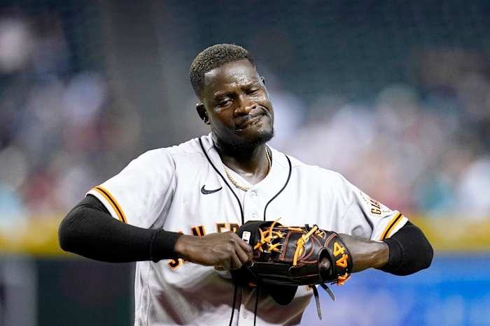 San Francisco Giants relief pitcher Yunior Marte walks off the field after being replaced during the eighth inning of a baseball game against the Arizona Diamondbacks Tuesday, July 26, 2022, in Phoenix. The Diamondbacks won 7-3.