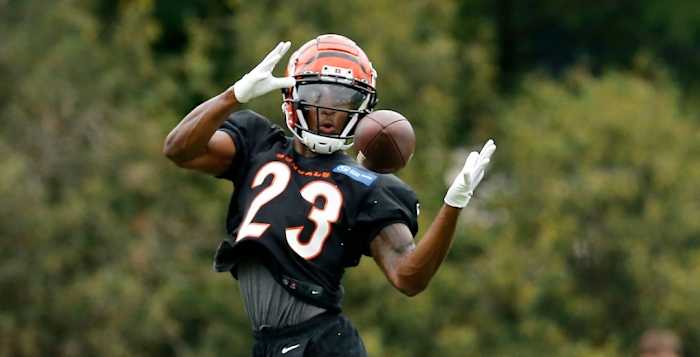 Cincinnati Bengals cornerback Dax Hill (23) catches a pass during the first day of preseason training camp at the Paul Brown Stadium training facility in downtown Cincinnati on Wednesday, July 27, 2022. Cincinnati Bengals Training Camp
