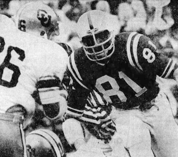 Nebraska’s Willie Harper closes in on the Buffs’ Cliff Branch.