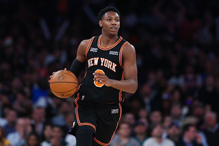 New York Knicks guard RJ Barrett (9) dribbles up court during the second half against the Atlanta Hawks at Madison Square Garden.