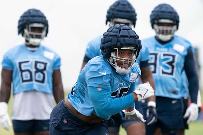 Tennessee Titans defensive lineman DeMarcus Walker (95) runs through pass rush drills during a training camp practice at Saint Thomas Sports Park Thursday, July 28, 2022, in Nashville, Tenn.