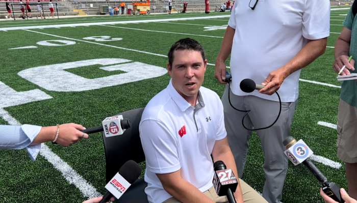 Wisconsin defensive coordinator Jim Leonhard fielding questions at football media days inside Camp Randall (Credit: Matt Belz, All Badgers)