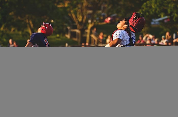 Tommy Courtney of the Harwich Mariners and Chatham Anglers catcher Dominic Tamez