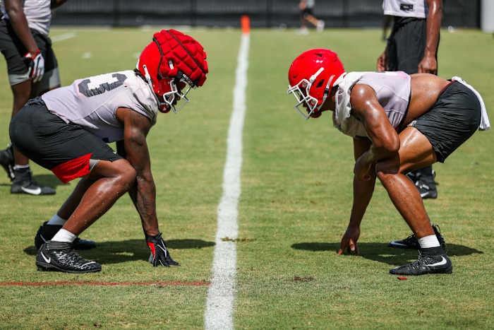 Nolan Smith prepares to give Robert Beal a look in practice.