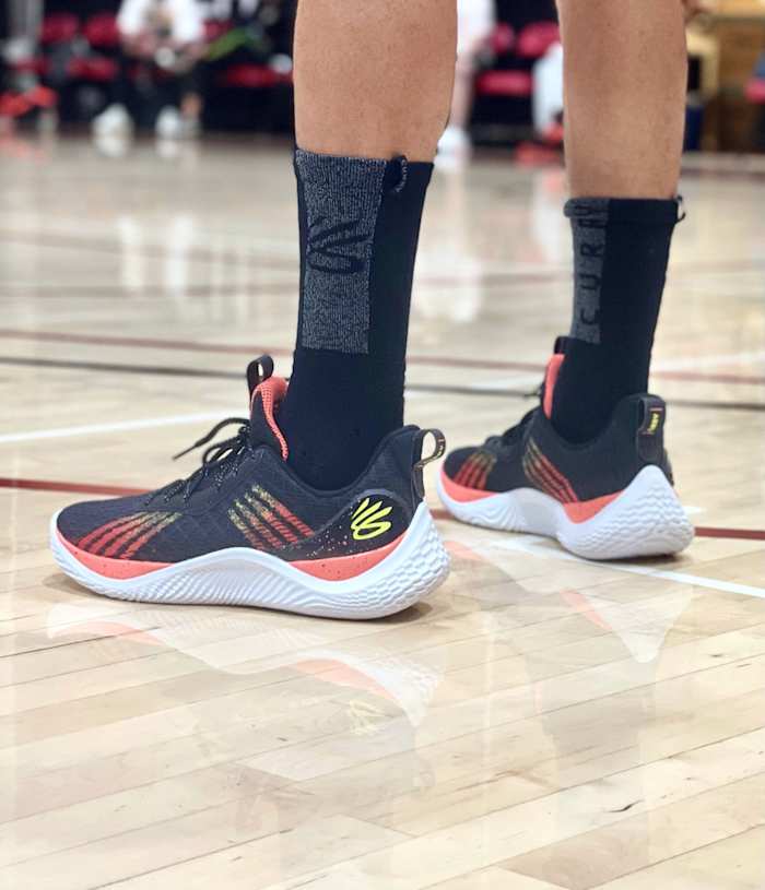 Golden State Warriors guard Stephen Curry debuted his 10th signature sneaker at Curry Brand Camp on August 5, 2022.