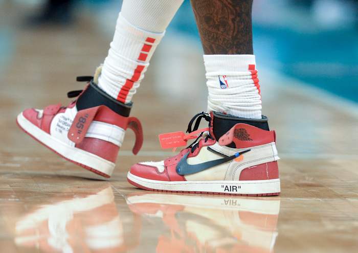 View of red and white Jordan sneakers.
