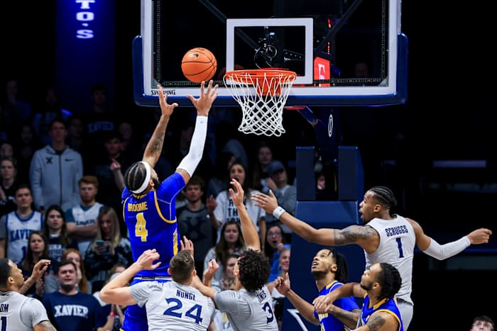 Dec 15, 2021; Cincinnati, Ohio, USA; Morehead State Eagles forward Johni Broome (4) drives to the basket against the Xavier Musketeers in the second half at the Cintas Center. Mandatory Credit: Aaron Doster-USA TODAY Sports