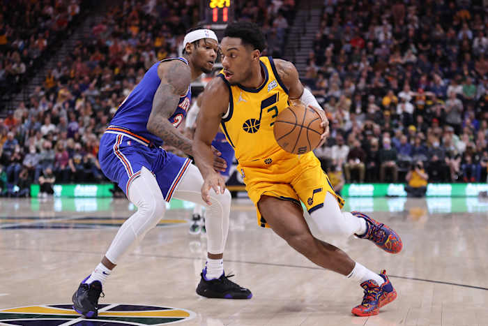Utah Jazz guard Trent Forrest (3) dribbles past New York Knicks forward Cam Reddish (21) in the third quarter at Vivint Arena.