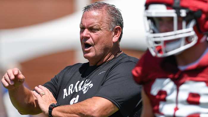 Razorbacks coach Sam Pittman during the first workout in pads Thursday, Aug. 11, 2022, on the outdoor practice fields in Fayetteville, Arkansas.