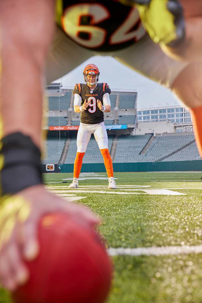 Joe Burrow poses to take a shotgun snap during a Sports Illustrated photo shoot