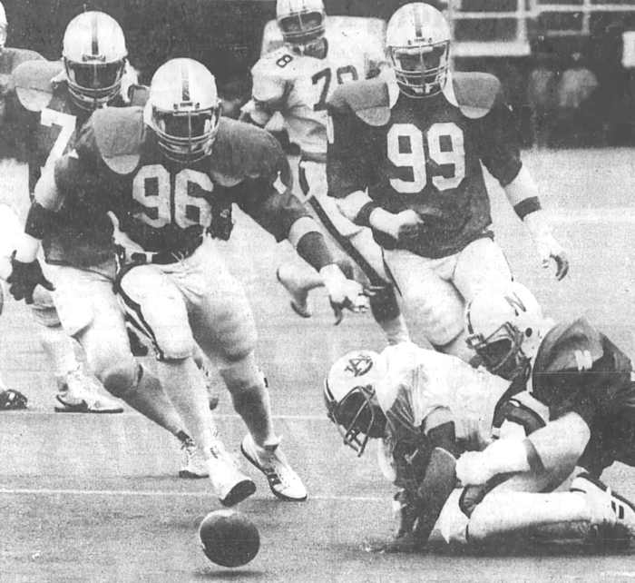 Jimmy Williams (96) gets ready to pounce on the Auburn fumble that set up Nebraska’s first touchdown.