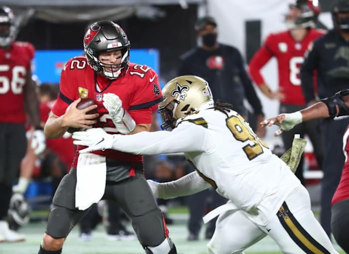 Nov 8, 2020; New Orleans Saints defensive tackle Malcom Brown (90) sacks Buccaneers quarterback Tom Brady (12). Mandatory Credit: Kim Klement-USA TODAY Sports