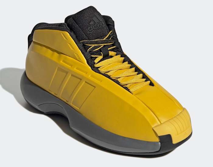 Yellow and black Adidas Kobe shoe.