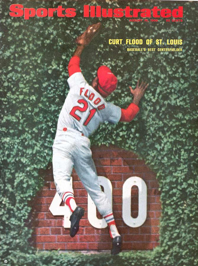 1968 Sports Illustrated cover featuring Curt Flood making a leaping catch