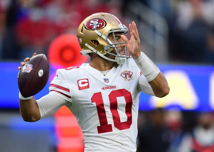 Jan 30, 2022; Inglewood, California, USA; San Francisco 49ers quarterback Jimmy Garoppolo throws a pass against the Los Angeles Rams during the NFC Championship Game at SoFi Stadium. Mandatory Credit: Gary A. Vasquez-USA TODAY Sports