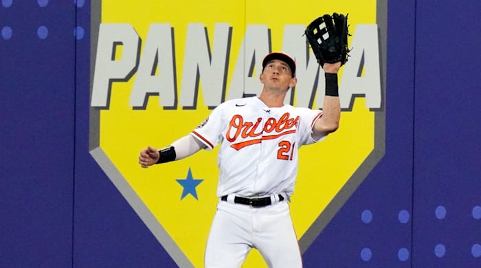 Austin Hays makes the catch on a fly ball hit by Boston Red Sox’s Alex Verdugo while wearing a microphone and talking with the ESPN broadcasters during the third inning of the MLB Little League Classic baseball game in Williamsport, Pa., Sunday, Aug. 21, 2022.