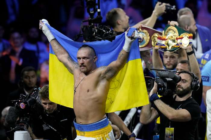 Ukraine's Oleksandr Usyk celebrates after beating Britain's Anthony Joshua to retain his world heavyweight title at King Abdullah Sports City in Jeddah, Saudi Arabia, Sunday, Aug. 21, 2022.