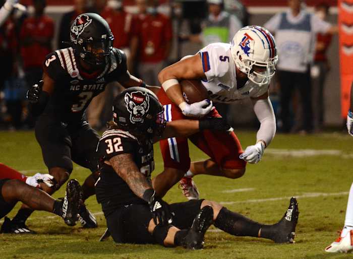 Louisiana Tech Bulldogs receiver Griffin Hebert (5) runs after a catch during the second half against the North Carolina State Wolfpack at Carter-Finley Stadium.