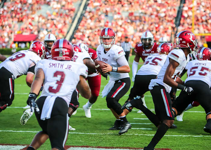 Troy Trojans quarterback Taylor Powell (7) looks to hand off to running back B.J. Smith (3) in the second quarter against the South Carolina Gamecocks Williams-Brice Stadium.
