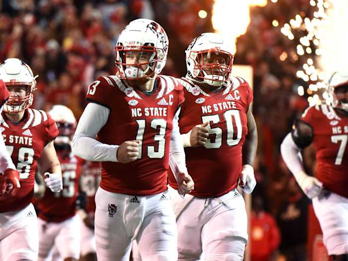 NC State QB Devin Leary runs on the field