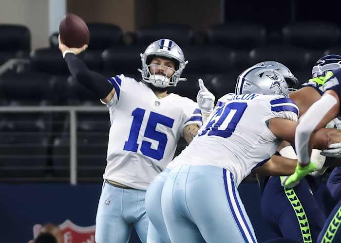 Aug 26, 2022; Arlington, Texas, USA; Dallas Cowboys quarterback Will Grier (15) throws during the first quarter Seattle Seahawks at AT&T Stadium.