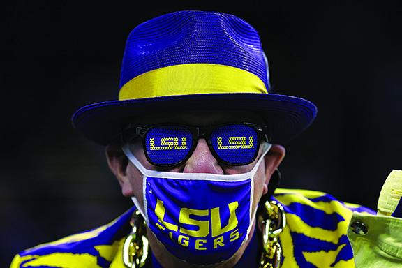 An LSU fan looks on at the Texas Bowl.