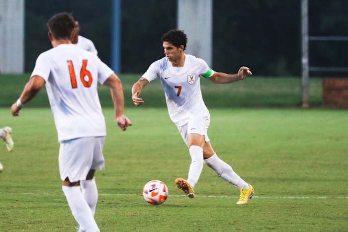 Virginia junior forward Leo Afonso looks to pass during UVA's game against Rider.