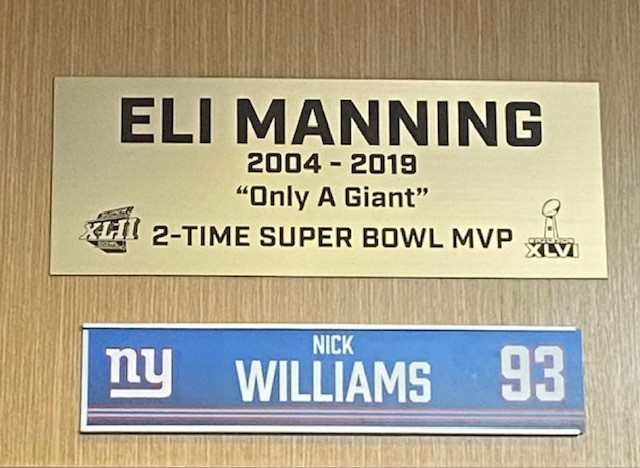 The special plaque marking the long-tie locker stall assignment held by retired Giants quarterback Eli Manning inside of the team's Quest Diagnostics Training Center.