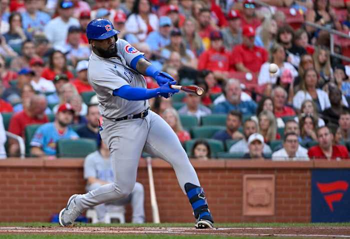 Chicago Cubs designated hitter Franmil Reyes collects an RBI base hit against the Cardinals on Saturday.