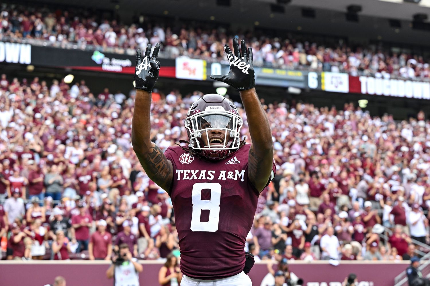 Sep 3, 2022; College Station, Texas, USA; Texas A&M Aggies wide receiver Yulkeith Brown (8) celebrates after his touchdown during the first quarter against the Sam Houston State Bearkats at Kyle Field.