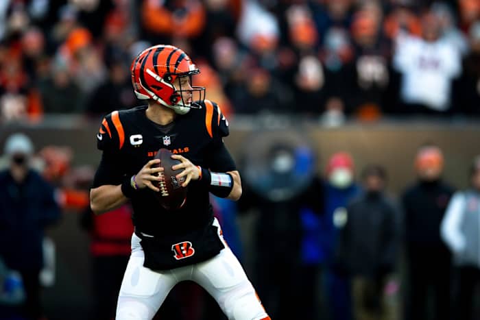 Cincinnati Bengals quarterback Joe Burrow (9) looks to pass in the second half the AFC wild card game on Saturday, Jan. 15, 2022, at Paul Brown Stadium in Cincinnati. Cincinnati Bengals defeated Las Vegas Raiders 26-19. Las Vegas Raiders At Cincinnati Bengals Playoff Ac 210