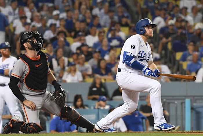 SF Giants catcher Joey Bart and Dodgers slugger Max Muncy watch a home run. (2022)