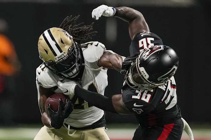 New Orleans Saints running back Alvin Kamara (41) straight arms Atlanta Falcons safety Shawn Williams (36). Mandatory Credit: Dale Zanine-USA TODAY
