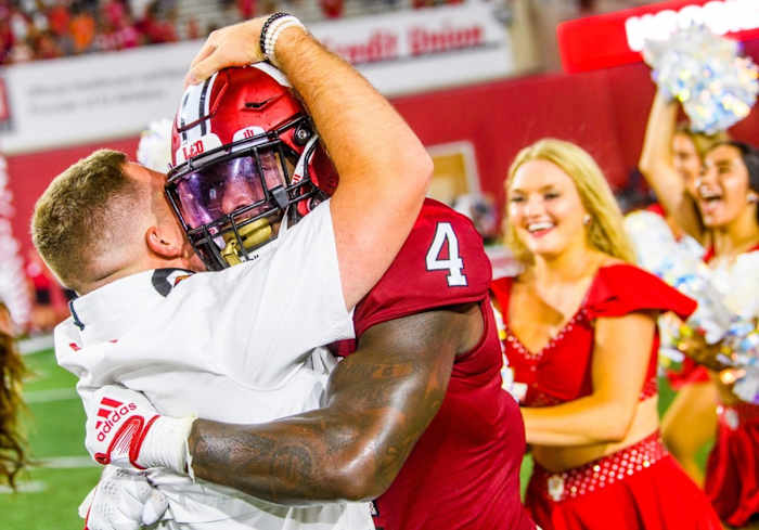Indiana linebacker Cam Jones (4) celebrates after the Hoosiers knocked off Illinois 23-20 on Friday night in Bloomington, Ind. (USA TODAY Sports)