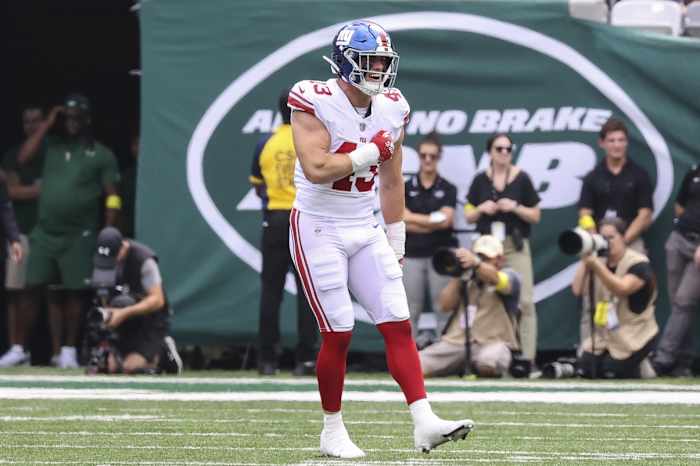 New York Giants linebacker Micah McFadden celebrates after causing a fumble recovery in the first half against the New York Jets at MetLife Stadium.