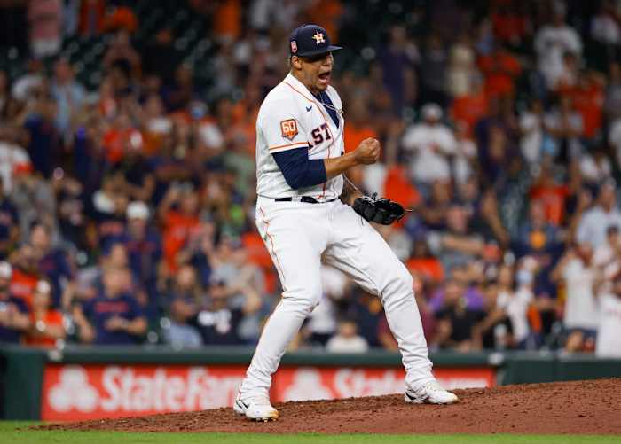 Houston Astros Bryan Abreu celebrates after getting the final out.