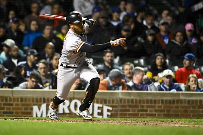 SF Giants shortstop Thairo Estrada singles against the Cubs.