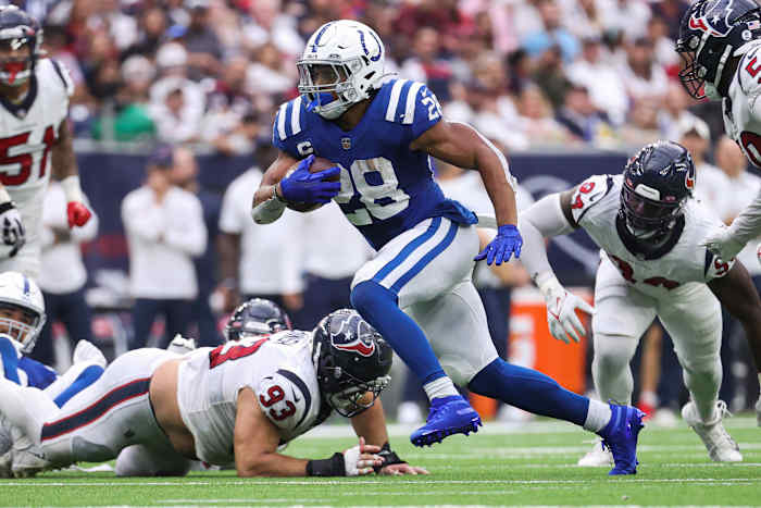 Sep 11, 2022; Houston, Texas, USA; Indianapolis Colts running back Jonathan Taylor (28) runs with the ball during the fourth quarter against the Houston Texans at NRG Stadium.