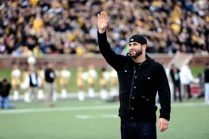 Missouri Tigers and New Orleans Saints quarterback Chase Daniel waves to fans during the first half against the Texas Tech Red Raiders at Faurot Field.