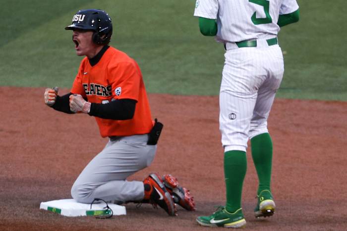 SF Giants prospect Wade Meckler celebrates after sliding into second base with Oregon State. (2022)