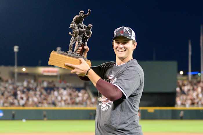 SF Giants prospect Will Bedna raises the most outstanding player award after leading Mississippi State over the Vanderbilt Commodores at TD Ameritrade Park.