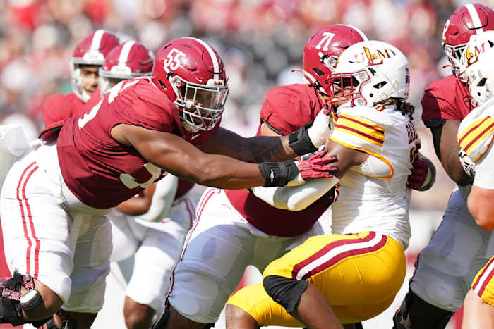 Alabama Crimson Tide offensive lineman Emil Ekiyor Jr. (55) blocks Louisiana Monroe Warhawks linebacker Quae Drake (10) at Bryant-Denny Stadium.