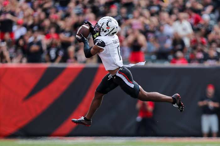 Sep 17, 2022; Cincinnati, Ohio, USA; Cincinnati Bearcats wide receiver Tre Tucker (1) catches a pass against the Miami Redhawks in the first half at Paycor Stadium. Mandatory Credit: Katie Stratman-USA TODAY Sports