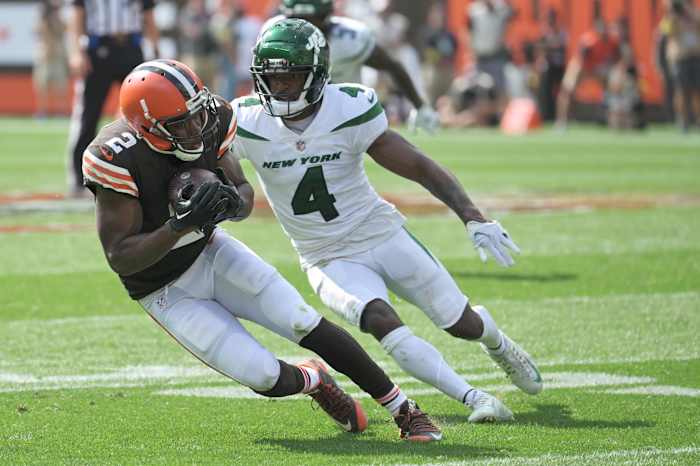 Sep 18, 2022; Cleveland, Ohio, USA; Cleveland Browns wide receiver Amari Cooper (2) catches a pass in front of New York Jets cornerback D.J. Reed (4) during the second half at FirstEnergy Stadium. Mandatory Credit: Ken Blaze-USA TODAY Sports
