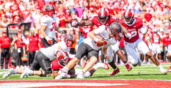 Indiana's Cam Jones (4) Myles Jackson (10) and Alfred Bryant (92) stop Western Kentucky's Austin Reed (16) on the one yard line during the Indiana versus Western Kentucky football game at Memorial Stadium on Sept. 17, 2022.